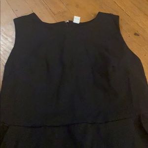 Sleeveless ponte knit sheath dress with pockets